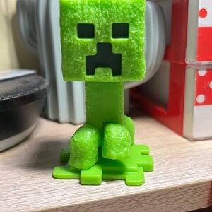 Green Creeper Figurine